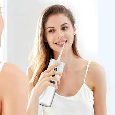 COMBO IRRIGADOR BUCAL + LAPIZ BLANQUEADOR DENTAL